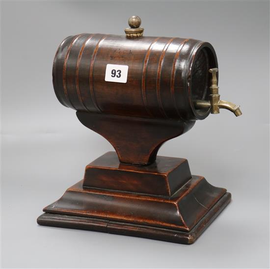 A George III mahogany barrel on stand, with brass tap, height 26cm